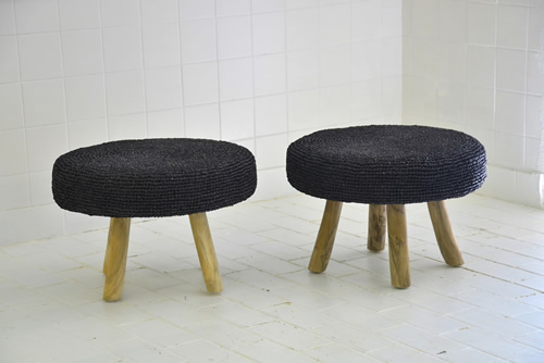 025 Ottomans - Black woven stool with natural wooden legs